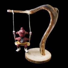 Navajo Hand-Crafted Mudhead Kachina on a Swing